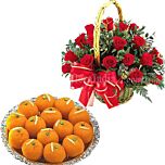 Round handle basket of Red roses & Motichur laddu Sweets