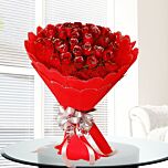 Flower Bunch of Red Roses in Red Paper Packing