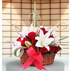 Basket Arrangement of White Asiatic Lilies and Red Roses
