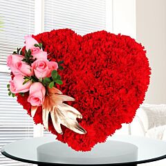 Flower Arrangement of Red Carnations in Heart Shape  