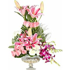 arrangement of Pink roses, white carnations, orchids and oriental lilies