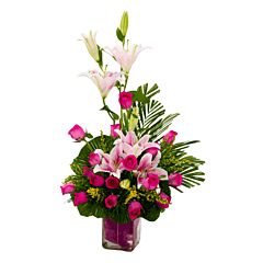 Oriental Lilies and Pink Roses in a glass vase