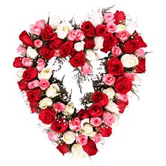 Heart shape arrangement of red roses, White Roses and Pink Roses