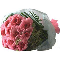 Bunch of Pink roses each wrapped in pink paper packing